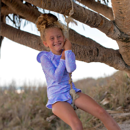 Uniquely designed girls swimsuit, featuring a closed back rash top