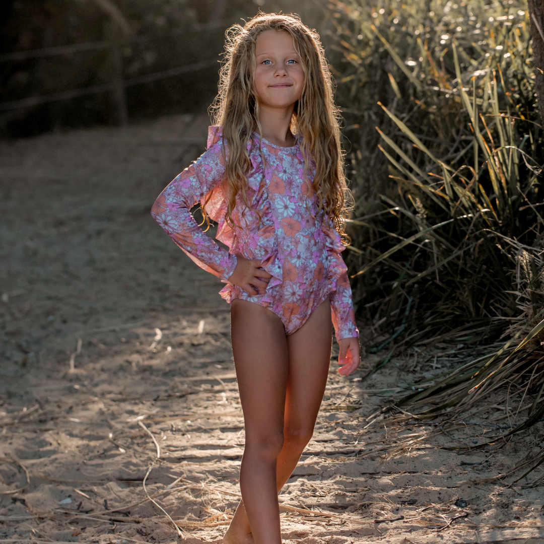 Our Tessa Kids Long Sleeve Swimsuit is the ultimate choice for parents who prioritise sun protection