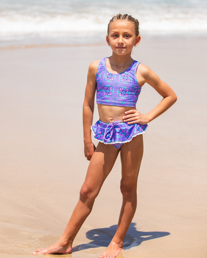 girl in tween bikini on beach